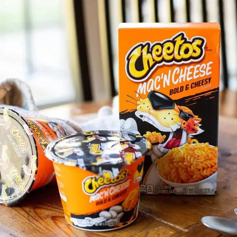 Cheetos Mac'n Cheese čaša i kartonsko pakiranje, narančasto-crni dizajn